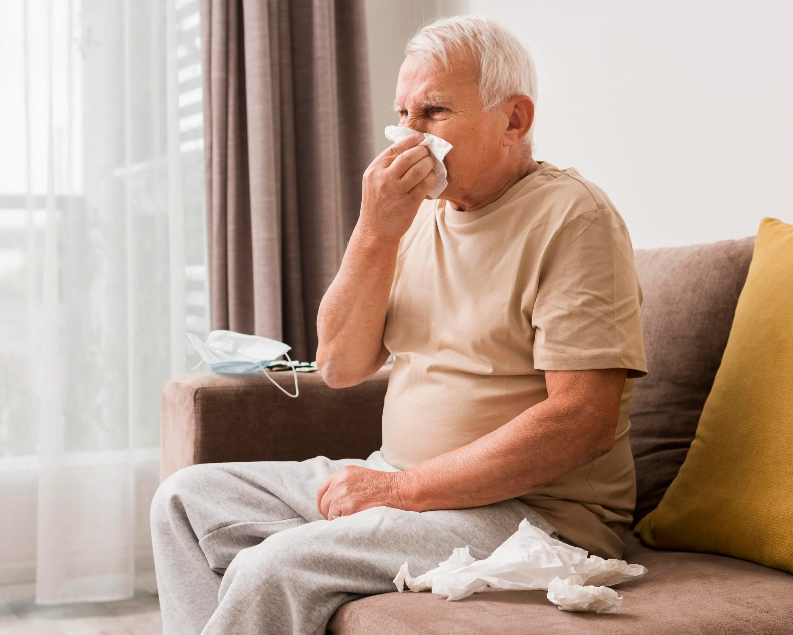 side view old man blowing his nose 1 2 scaled 1
